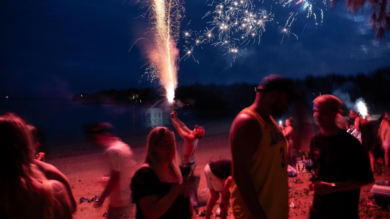 man puts firework on head video